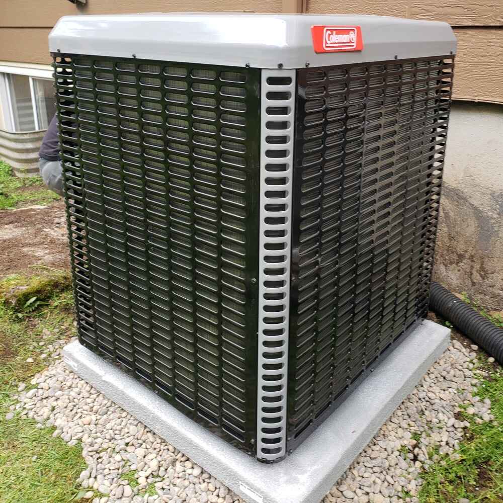 Residential air conditioner installation featuring a newly placed Lennox outdoor condenser unit on a concrete pad beside a home.